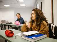 woman studying inside the classroom