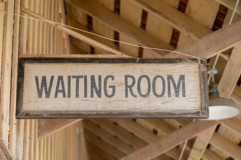 close up photo of a wooden signage